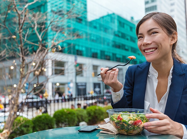 a businesswoman eating lunch